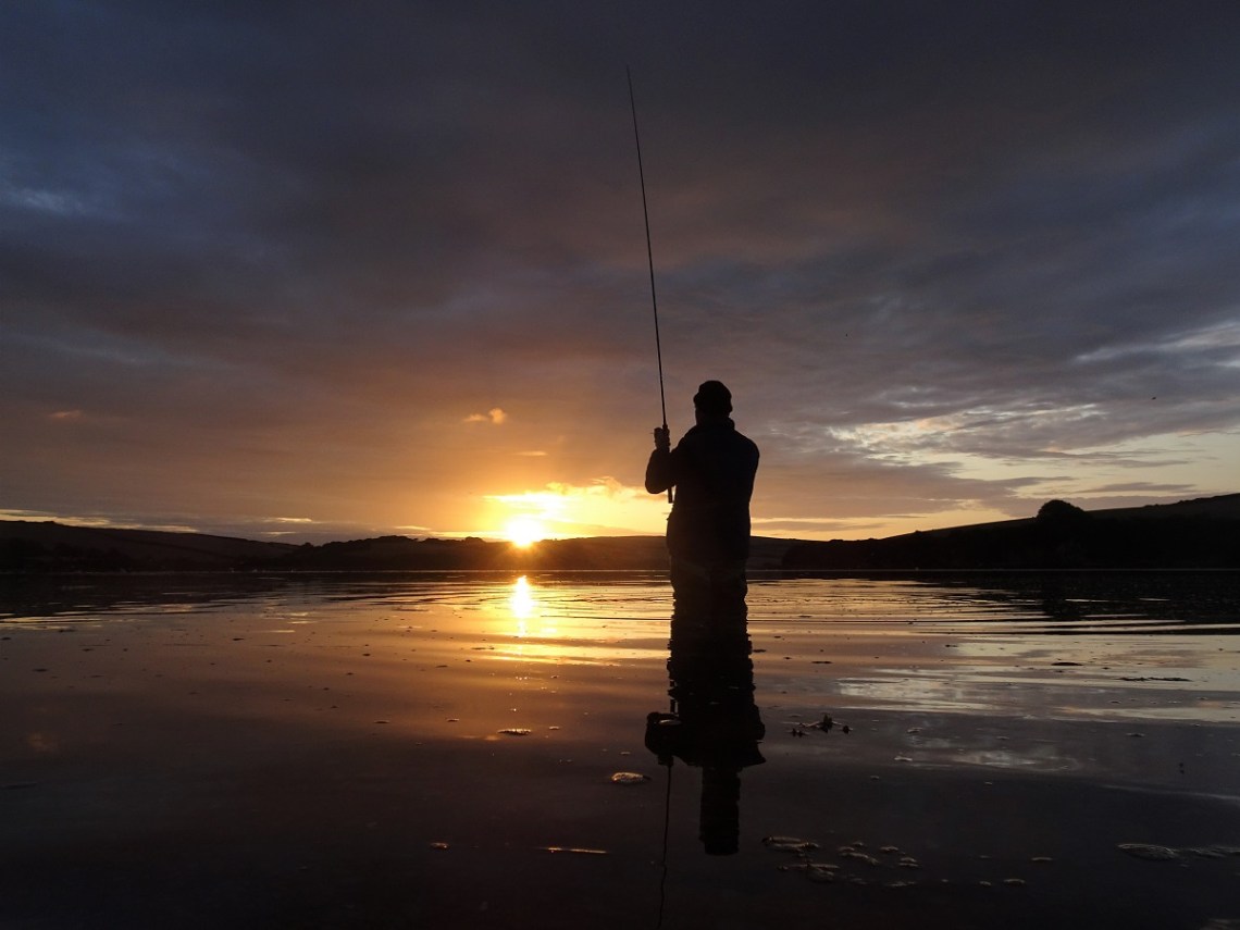 bass lure fishing at dawn