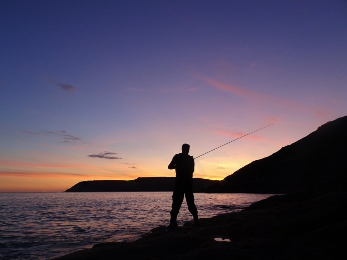 Bass lure fishing at dusk